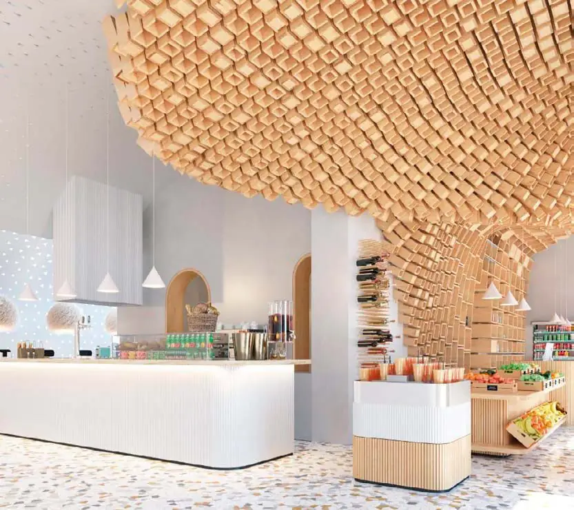 Estructura ondulada de cajas de madera sobre un mostrador blanco en un interior luminoso