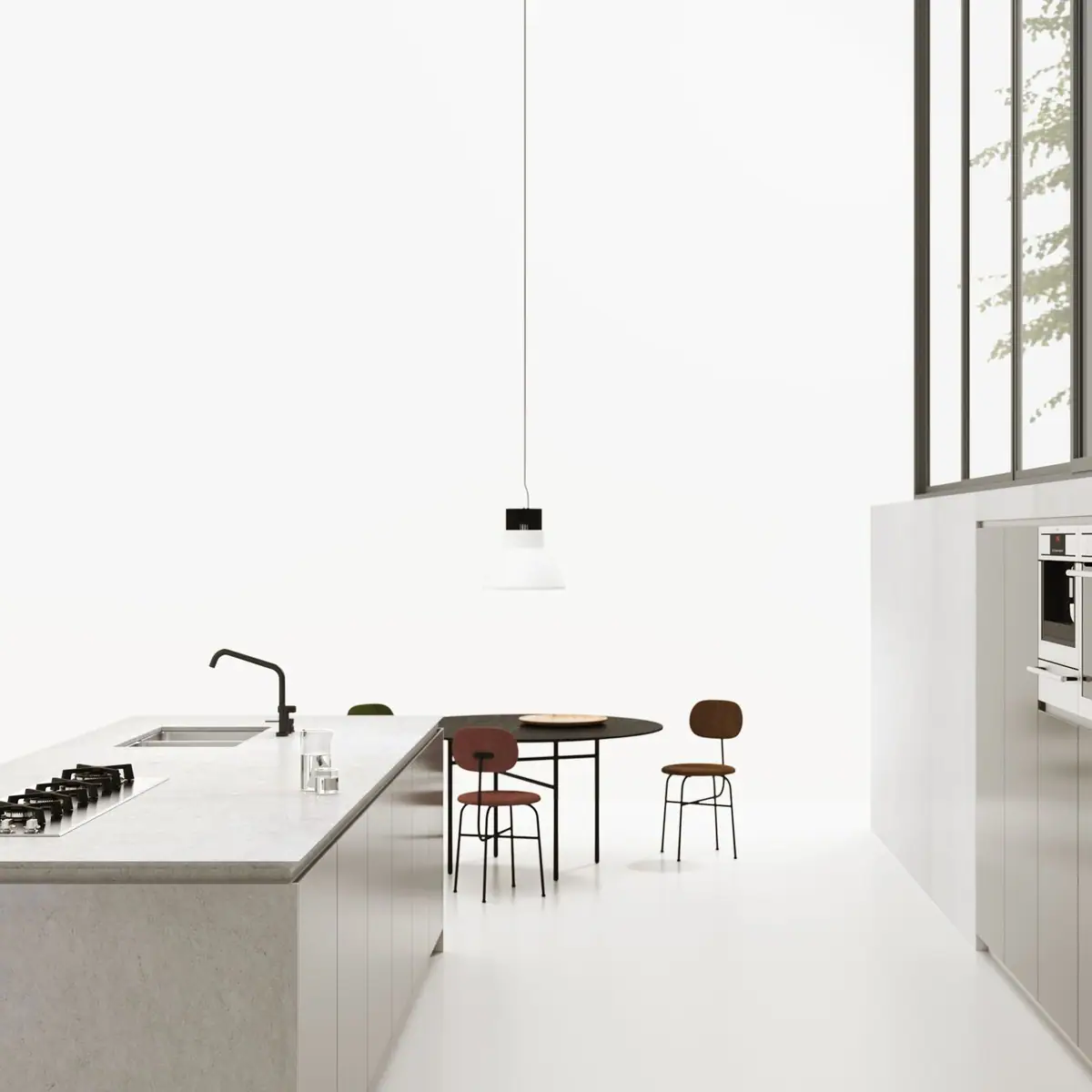 Cocina con isla de encimera gris claro de Obsidiana Pearl, mesa negra y sillas, en un espacio blanco de doble altura