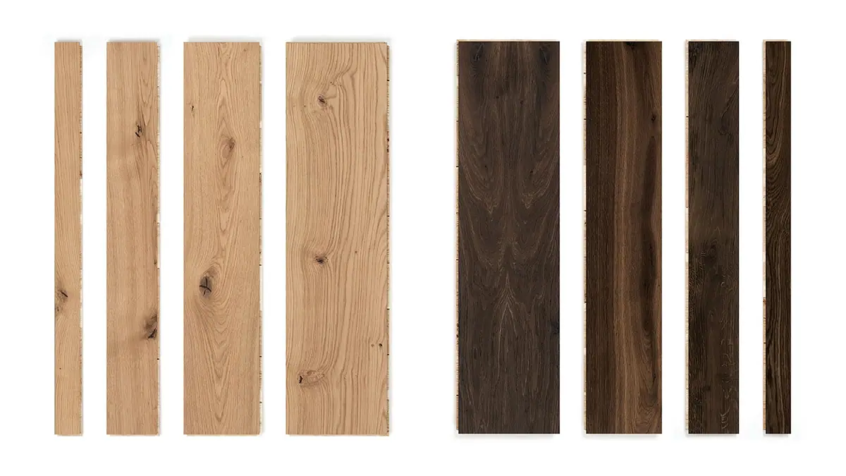 Ocho tablas de parqué de roble de distintos anchos, cuatro en tono natural y cuatro en tono oscuro, sobre fondo blanco