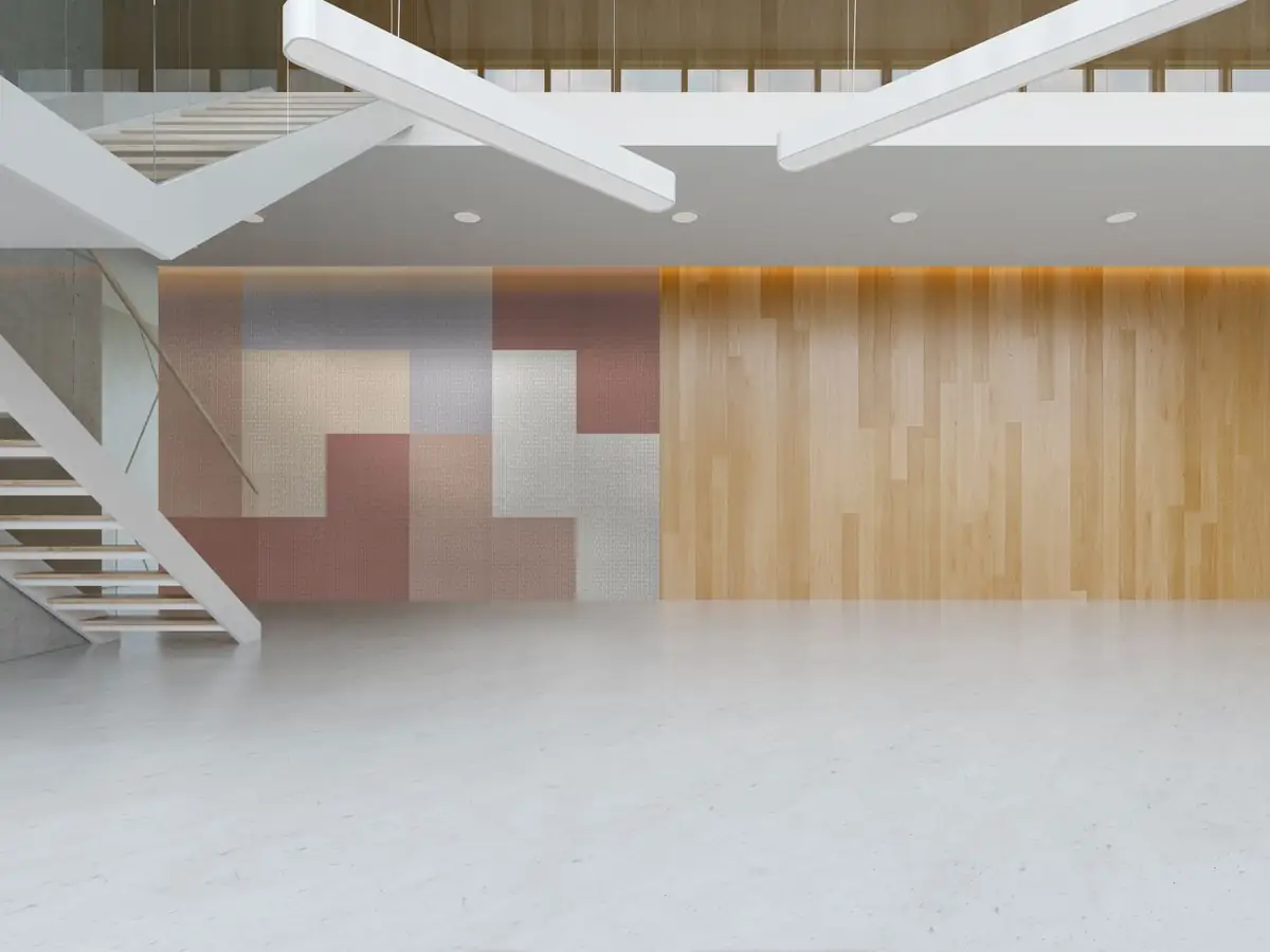 Vestíbulo con escalera blanca y pared revestida con paneles PLUMA en rosa, gris y blanco junto a un revestimiento de madera